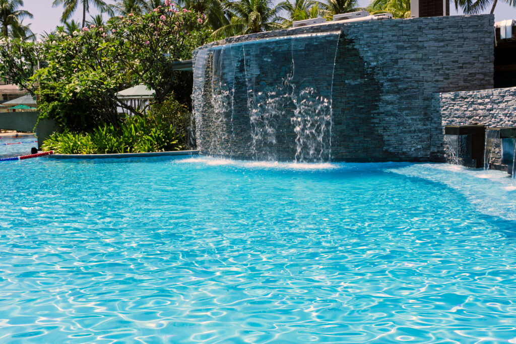 A swimming pool with a rock